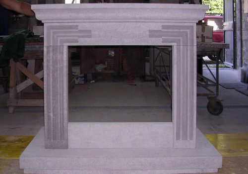Realizzazione Cornice Camino in Pietra